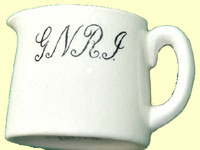 click for 6K .jpg image of GNRI milk jug.